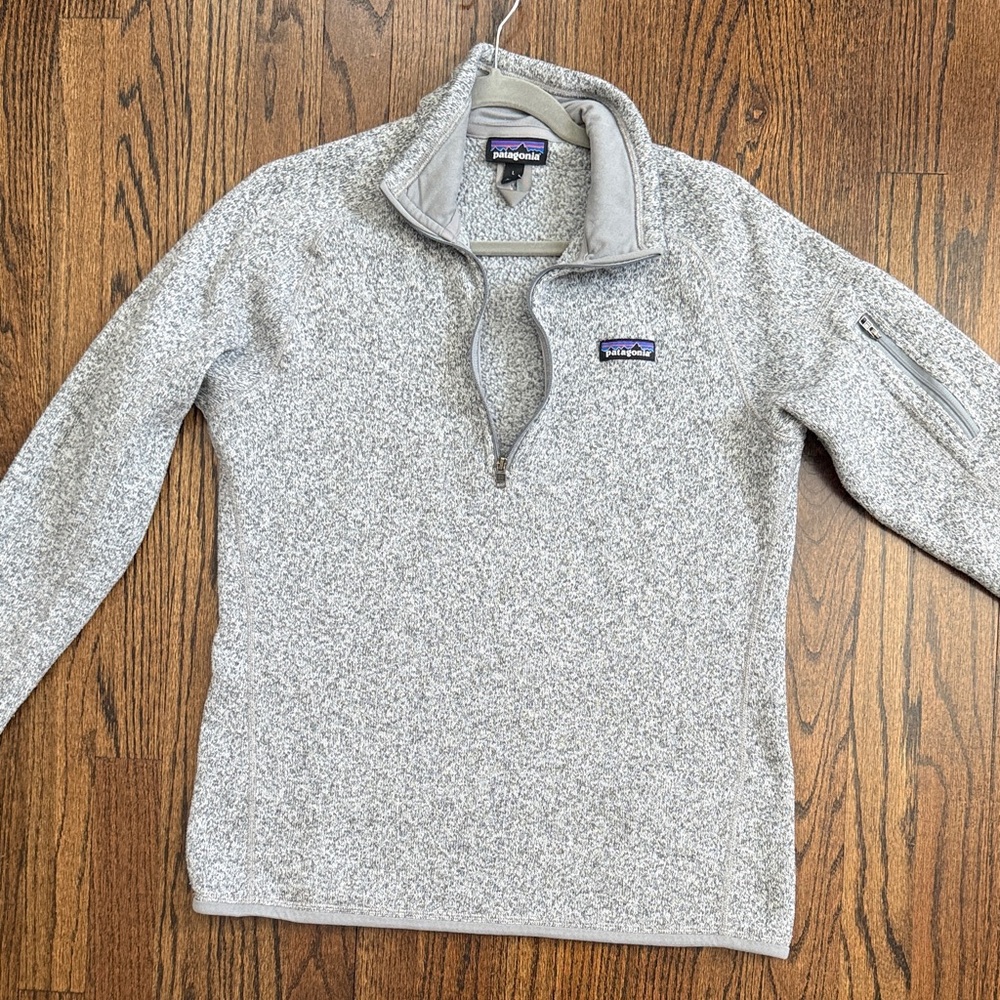 Patagonia woman’s Zip-Up Sweater in Light Gray